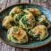Spinatknödel mit Nussbutter und Bergkäse